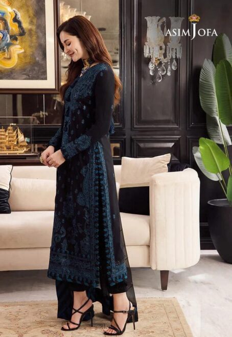 Model wearing Asim Jofa luxury chiffon embroidered 3 piece suit showing elegant side view