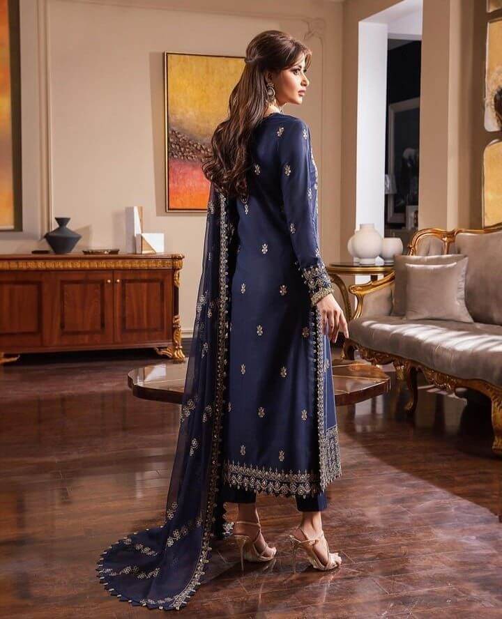 Actress wearing Asim Jofa luxury chiffon embroidered 3 piece suit showing back embroidery