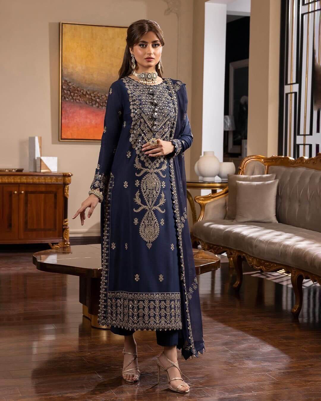 Actress wearing Asim Jofa luxury chiffon embroidered unstitched 3 piece suit front design